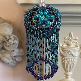 Beaded bauble Christmas tree ornament cover.