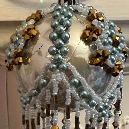 Beaded bauble Christmas tree ornament cover.