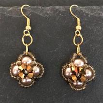 Gold pearl and crystal earrings.