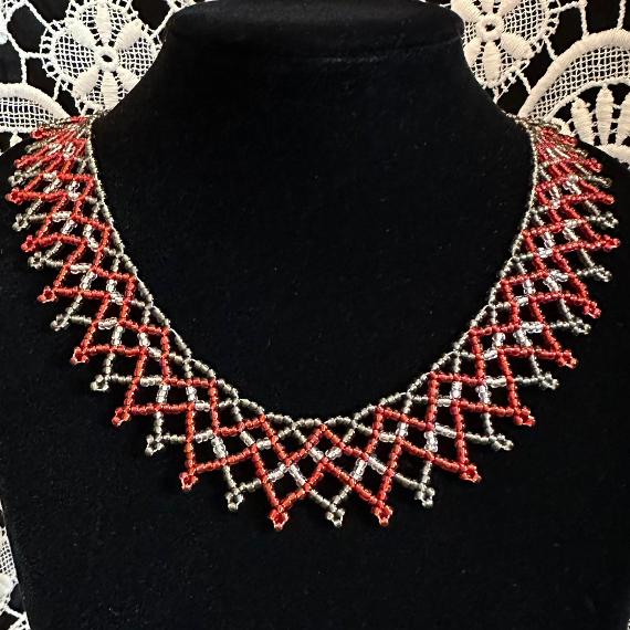 A beaded lace necklace.