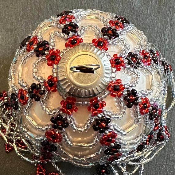 Beaded bauble ornament cover.