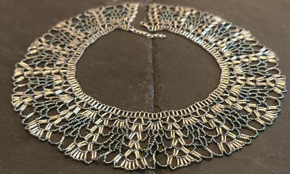 A beaded lace necklace.