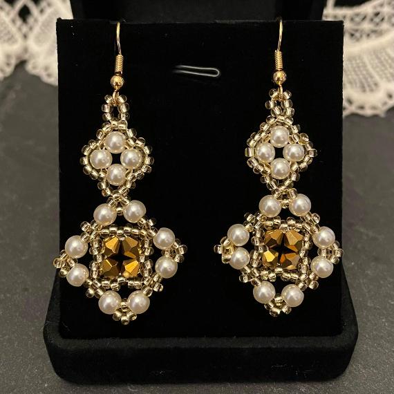 Tudor earrings made from pearls and crystals.