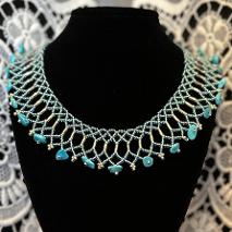 A beaded lace necklace.